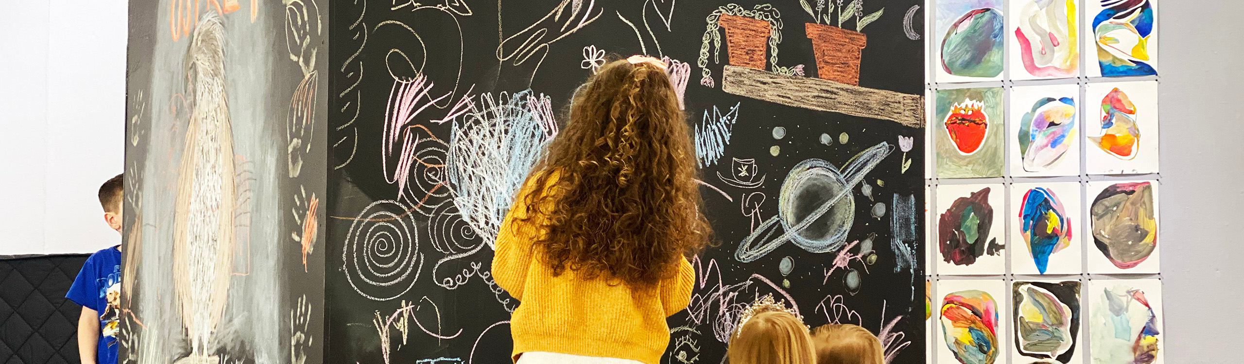 kids at an interactive art exhibition
