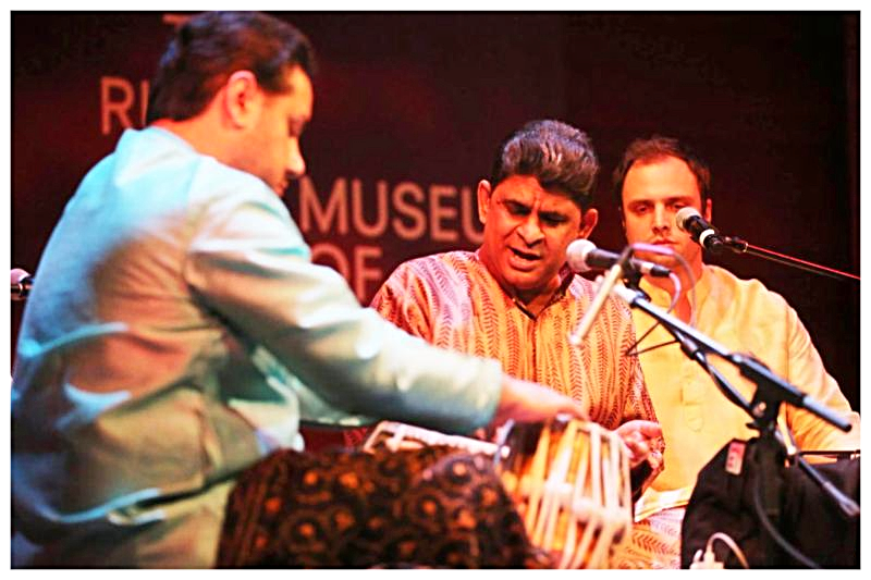 Guru, Pt. Sanjoy Banerjee (at center), Apprenctice, Andrew Shantz (at right), in performance