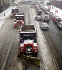 NJDOT utilizes contractors to help clear the roads during a winter storm photo